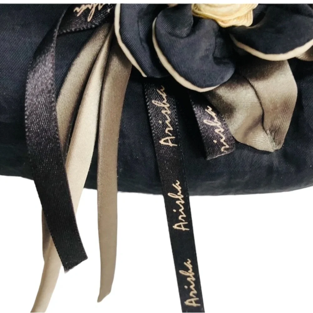 Arisha black super cute microfiber like fabric bag w/ attached flower detail